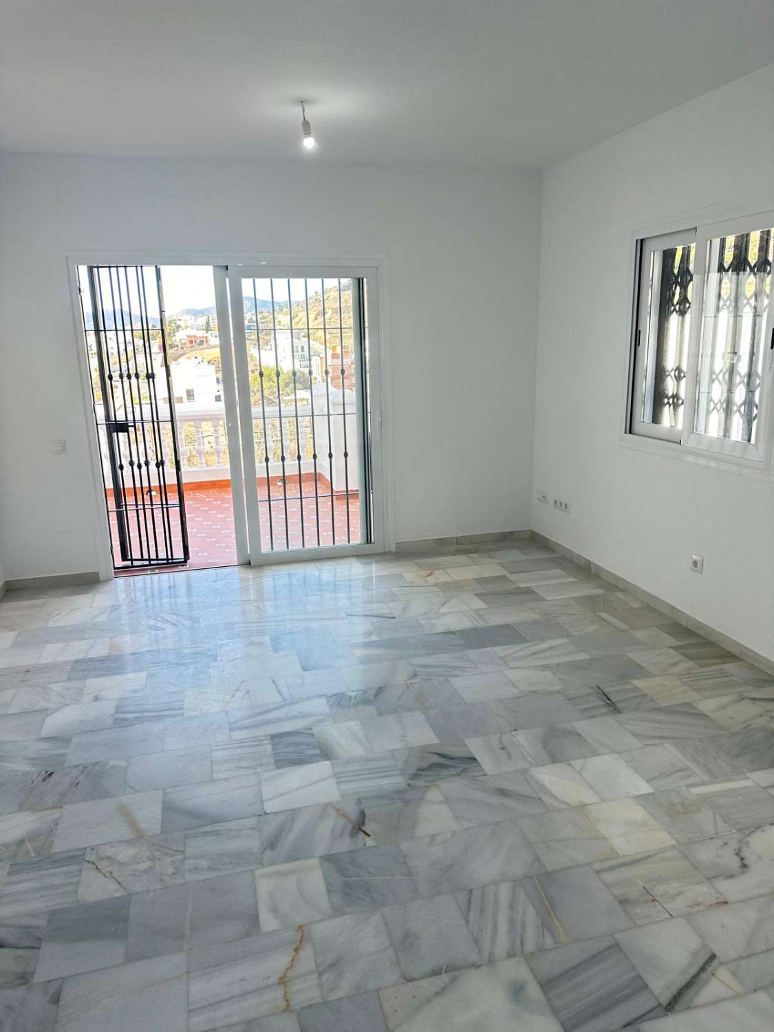 Stylish Renovated Townhouse with Terraces, Roof terrace & Garage in Los Olivos (Fuente del Baden area – Nerja)